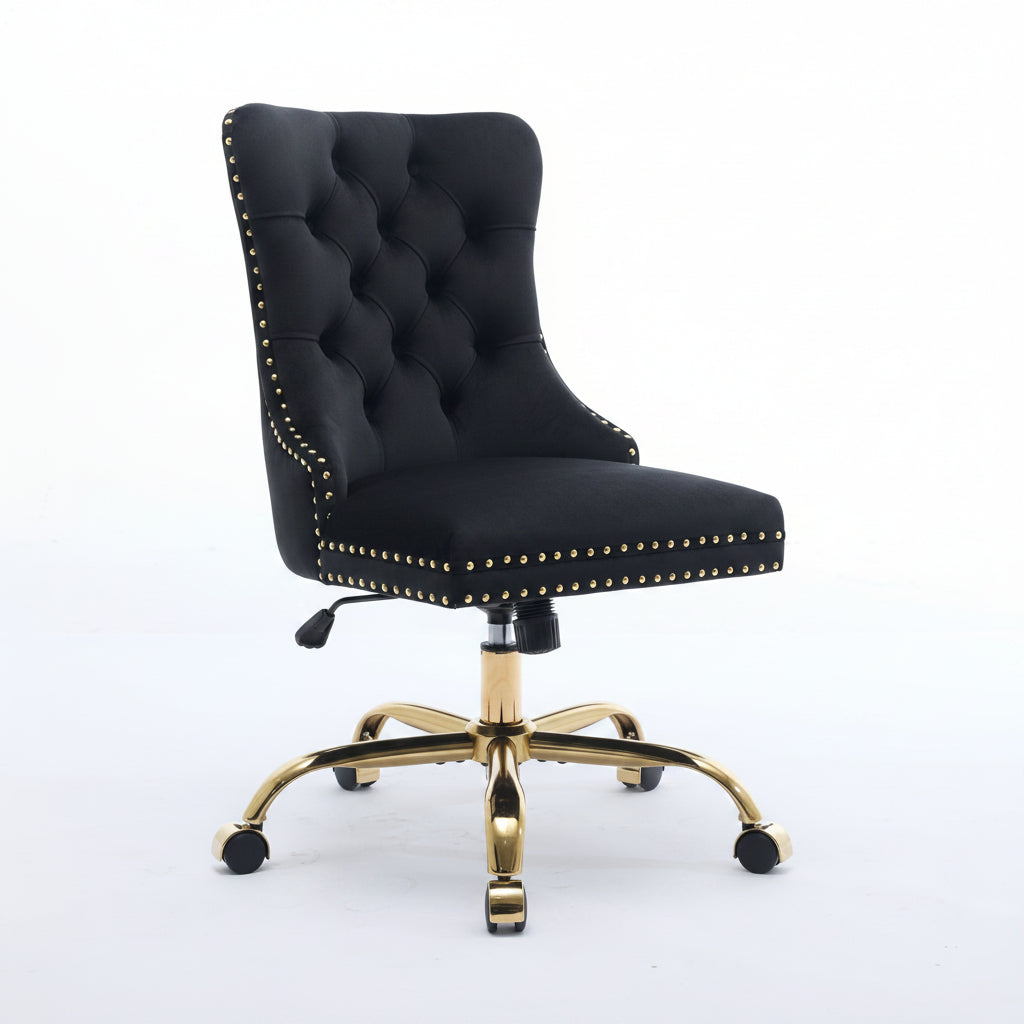Black office chair with gold accents on a white background