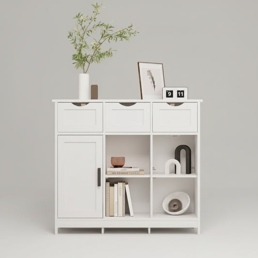 White storage cabinet with decorative items in a room with plants and a sofa.